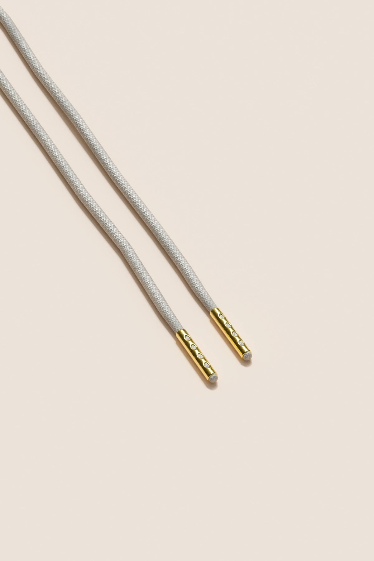 Senkels Nickel Grey 2.5mm Round Waxed Shoelaces with Gold Aglets